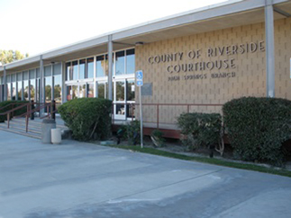 Palm Springs Courthouse framed by manicured bushes